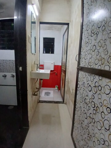 Bathroom in 1 BHK Apartment at Sukruti Society, Vashi Sector 30a – for Rent