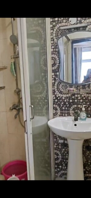 Bathroom in 2 BHK Apartment at Prateek Wisteria, Sector 77 – for Sale