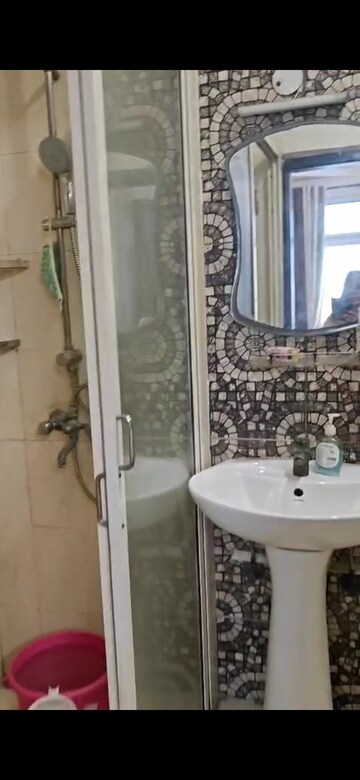 Bathroom in 2 BHK Apartment at Prateek Wisteria, Sector 77 – for Sale