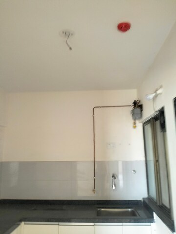 Kitchen in 2 BHK Apartment at Kolte Patil Rose Parade, Kondhwa – for Rent