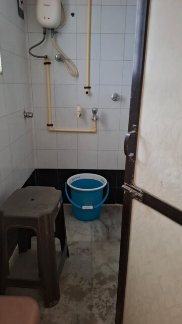Bathroom in 1 BHK Apartment at Vasant Valley Complex, Malad East – for Rent