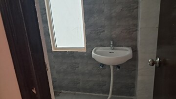 Bathroom in 2.5 BHK Apartment at Amrapali Dream Valley, Tech Zone 4 Greater Noida – for Sale