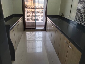 Kitchen in 2 BHK Apartment at Ambika Heights, Nerul – for Rent