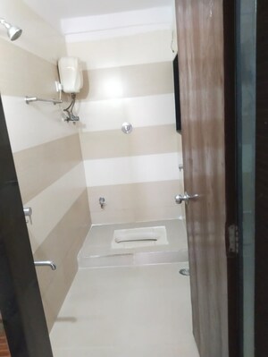Bathroom in 2 BHK Apartment at Ambika Heights, Nerul – for Rent