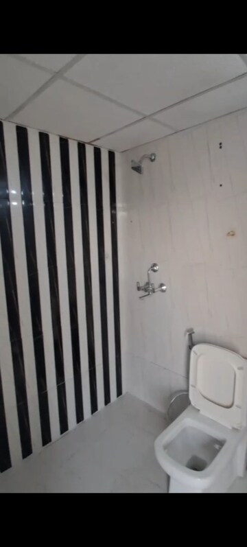 Bathroom in 2 BHK Apartment at Nilaya Greens, Raj Nagar Extension – for Sale