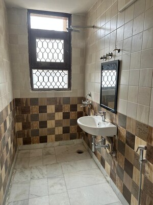 Bathroom in 3 BHK Apartment at Unitech Uniworld City, Sector 30 – for Sale