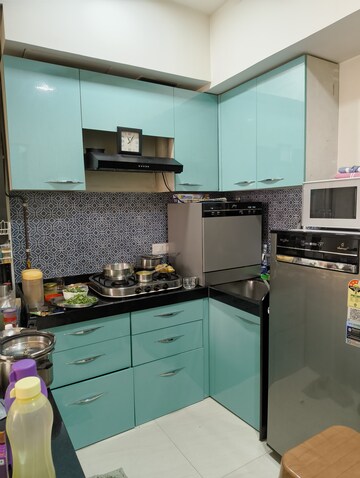Kitchen in 1 BHK Apartment at Lodha Quality Home Tower 5, Majiwada – for Rent
