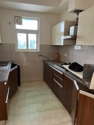 Kitchen in 3 BHK Apartment at Puri Anand Villas Phase II, Sector 81 – for Rent