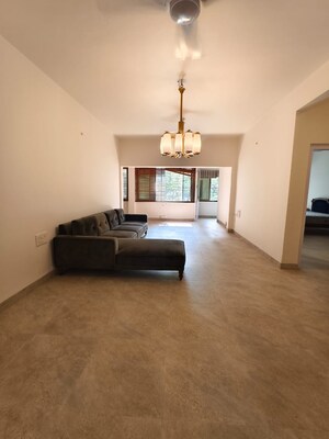 Living Room in 2 BHK Apartment at Metropolitan CHS, Pali Hill – for Rent