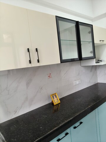 Kitchen in 2 BHK Apartment at Swastik Regalia, Waghbil – for Rent