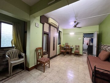 Living Room in 1 BHK Apartment at Chandravadan CHS, Ganeshwadi – for Rent