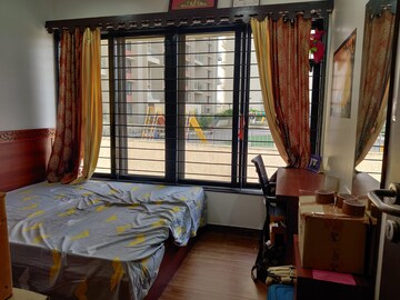 Bedroom in 2.5 BHK Apartment at Magarpatta Nanded City Sargam, Sinhagad – for Rent