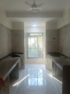 Kitchen in 4 BHK Apartment at Paradigm Artteza, Santacruz West – for Rent