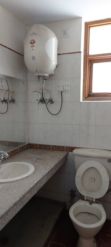 Bathroom in 4 BHK Apartment at Ansal Sushant Estate, Sector 52 – for Rent