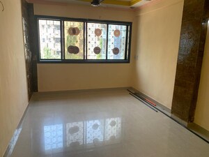Room in 1 BHK Apartment at Unity Apartment Malad, Malad West – for Rent