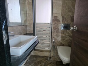 Bathroom in 2 BHK Apartment at Lokhandwala Spring Grove, Kandivali East – for Rent