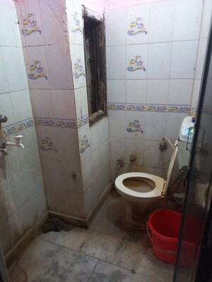 Bathroom in 2.5 BHK Apartment at Om Vihar – for Sale