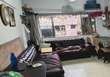 Living Room in 1 BHK Apartment at Alica Nagar CHS, Kandivali East – for Sale