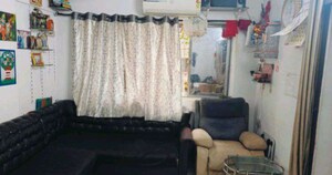 Living Room in 1 BHK Apartment at Alica Nagar CHS, Kandivali East – for Sale