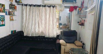 Living Room in 1 BHK Apartment at Alica Nagar CHS, Kandivali East – for Sale