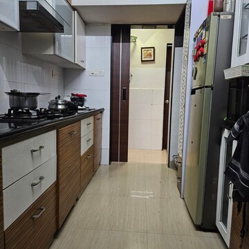 Kitchen in 2 BHK Apartment at Bhoomi Ekta Garden Phase III, Khande Rao Dongari – for Rent