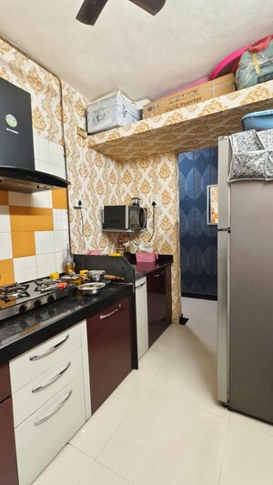 Kitchen in 1 BHK Apartment at Raunak Bliss, Ghodbunder Road – for Rent