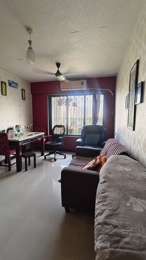 Living Room in 1 BHK Apartment at Raunak Bliss, Ghodbunder Road – for Rent