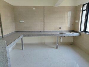 Kitchen in 2 BHK Apartment at Wadgaon Sheri – for Rent