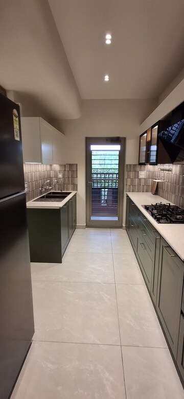 Kitchen in 4 BHK Apartment at Tulip Crimson, Sector 70 – for Sale