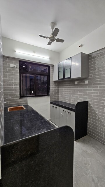 Kitchen in 2 BHK Apartment at Avaas Deepanjali CHS, Nilemore – for Sale