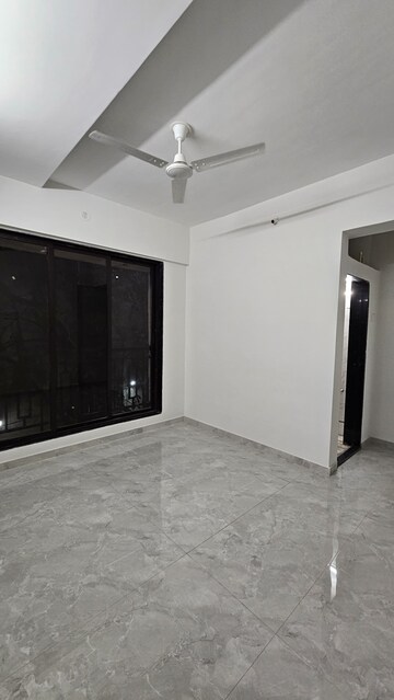 Living Room in 2 BHK Apartment at Avaas Deepanjali CHS, Nilemore – for Sale