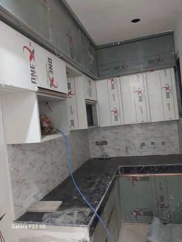 Kitchen in 3 BHK Builder Floor at Raj Nagar Extension – for Sale