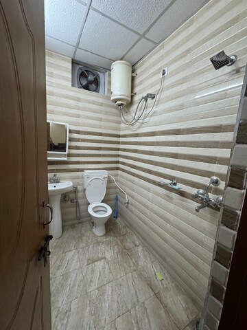 Bathroom in 2 BHK Apartment at Sahastradhara Road – for Rent