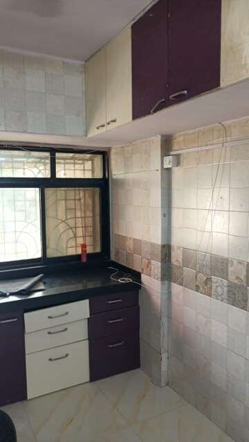 Kitchen in 2 BHK Apartment at Vashi Parshvadham CHS, Vashi Sector 28 – for Rent