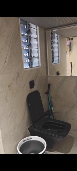 Bathroom in 1.5 BHK Apartment at Zainab Tower, Madanpura – for Sale