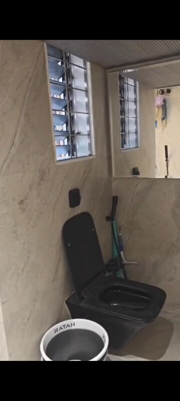 Bathroom in 1.5 BHK Apartment at Zainab Tower, Madanpura – for Sale