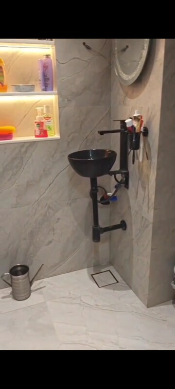 Bathroom in 1.5 BHK Apartment at Zainab Tower, Madanpura – for Sale