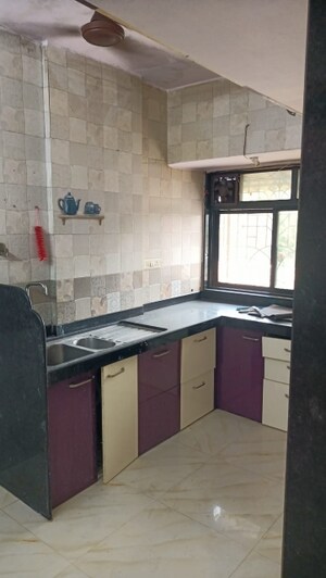 Kitchen in 2 BHK Apartment at Vashi Parshvadham CHS, Vashi Sector 28 – for Rent