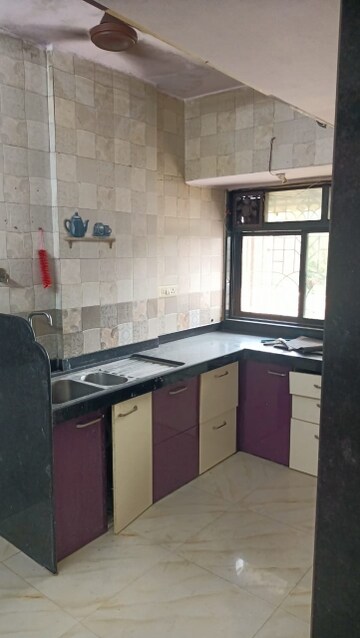 Kitchen in 2 BHK Apartment at Vashi Parshvadham CHS, Vashi Sector 28 – for Rent