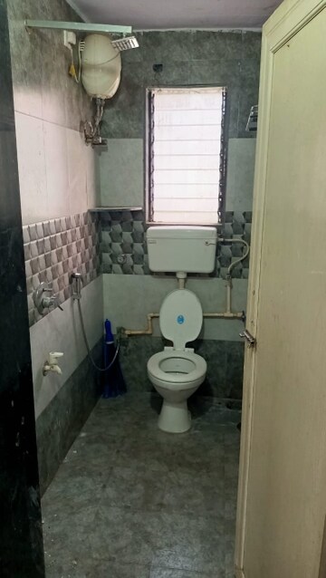 Bathroom in 2 BHK Apartment at Vashi Parshvadham CHS, Vashi Sector 28 – for Rent