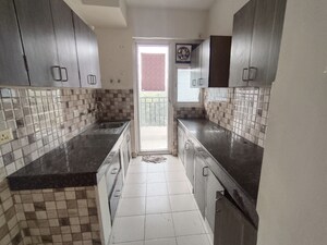 Kitchen in 3 BHK Apartment at Mapsko Paradise, Sector 83 – for Sale