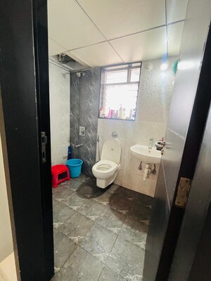 Bathroom in 2 BHK Apartment at Paranjape Azure, Tathawade – for Rent