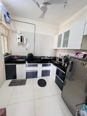 Kitchen in 2 BHK Apartment at Paranjape Azure, Tathawade – for Rent