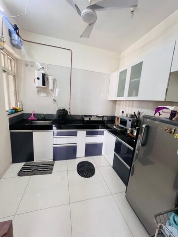 Kitchen in 2 BHK Apartment at Paranjape Azure, Tathawade – for Rent