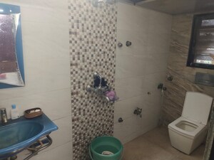 Bathroom in 2 BHK Apartment at Gokul Avenue Apartment, Kandivali East – for Sale