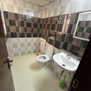 Bathroom in 3 BHK Apartment at Unnati Fortune The Aranya, Sector 119 – for Rent