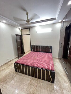 Bedroom in 2 BHK Builder Floor at K Block Central Square Awasiya Vikas Samiti, Kalkaji – for Rent