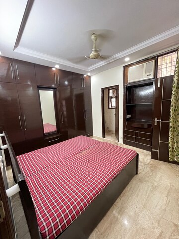 Bedroom in 2 BHK Builder Floor at K Block Central Square Awasiya Vikas Samiti, Kalkaji – for Rent