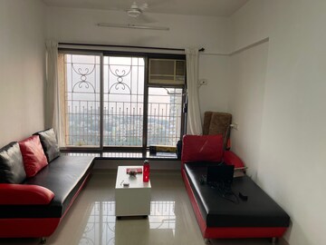 Living Room in 1 BHK Apartment at Pegasus Tower, Andheri West – for Rent