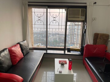 Living Room in 1 BHK Apartment at Pegasus Tower, Andheri West – for Rent